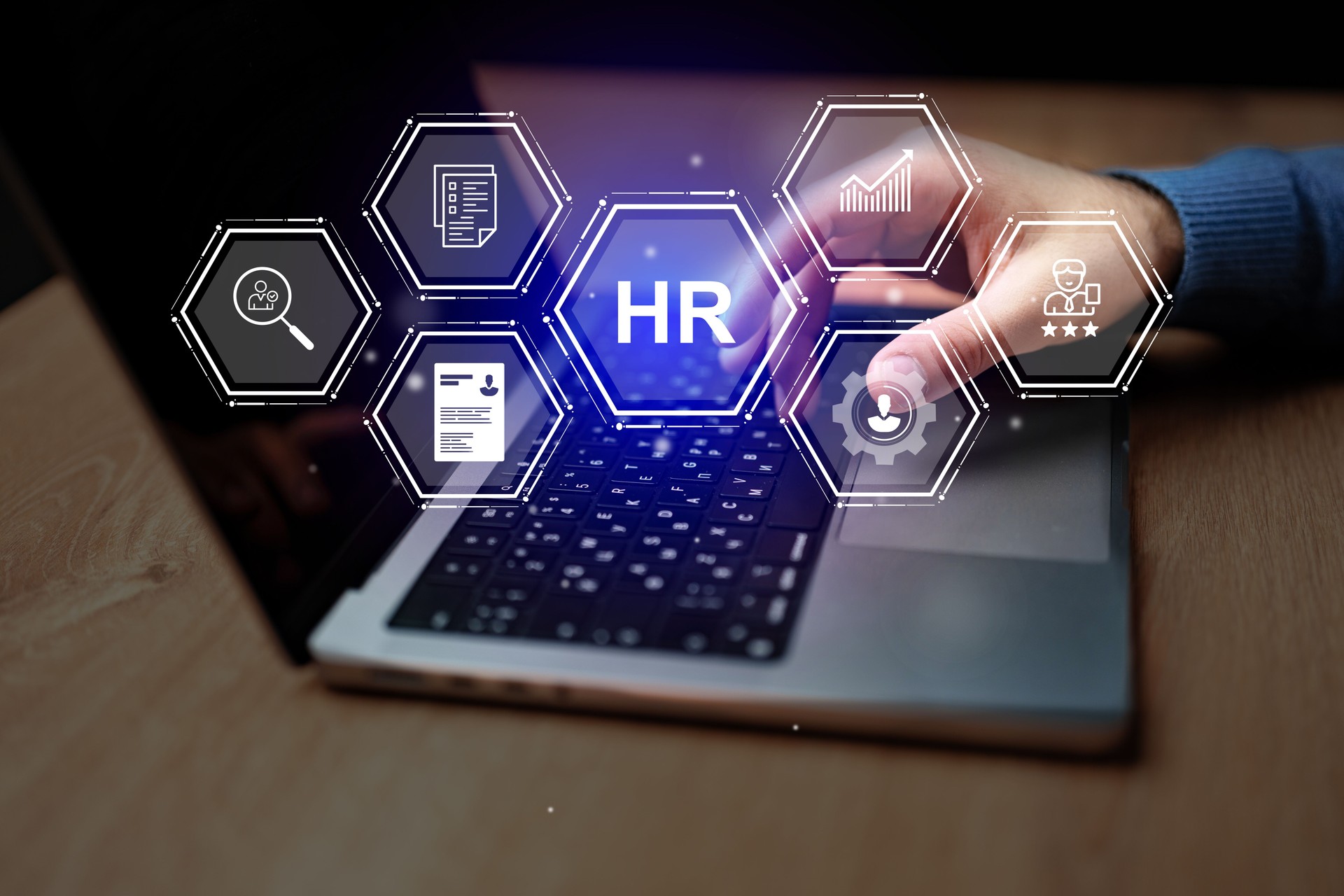 Human resources management concepts displayed on a laptop at a modern workspace during work hours